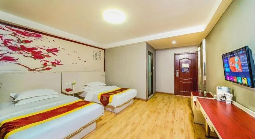 Bed in Kunlun Leju Business Hotel Kaifeng Gulou