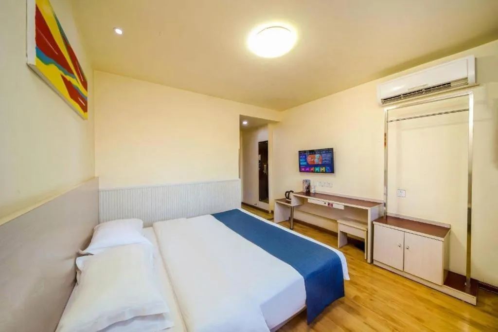 Bed in Kunlun Leju Business Hotel Kaifeng Gulou