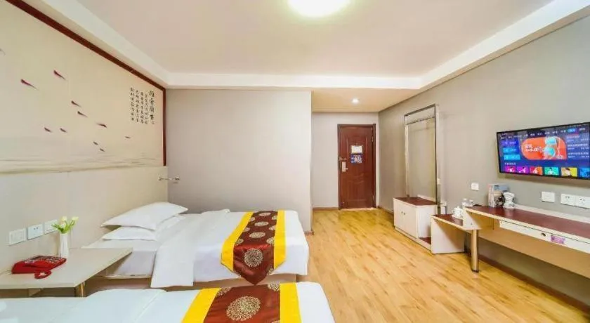 Bed in Kunlun Leju Business Hotel Kaifeng Gulou