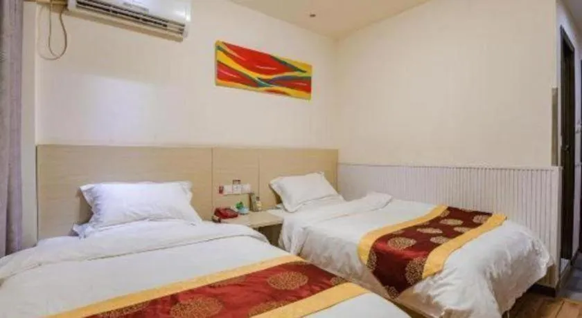 Bed in Kunlun Leju Business Hotel Kaifeng Gulou