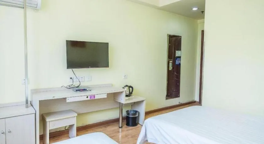 Bed in Kunlun Leju Business Hotel Kaifeng Gulou