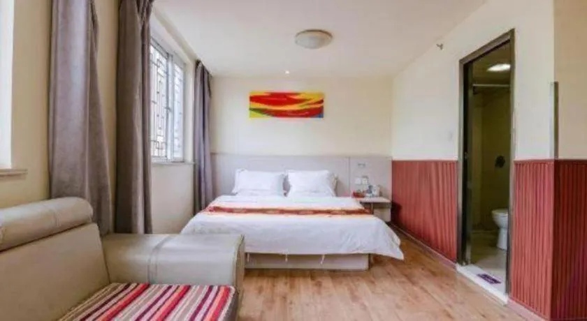 Bed in Kunlun Leju Business Hotel Kaifeng Gulou