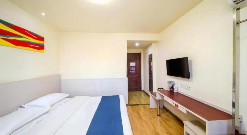 Bed in Kunlun Leju Business Hotel Kaifeng Gulou