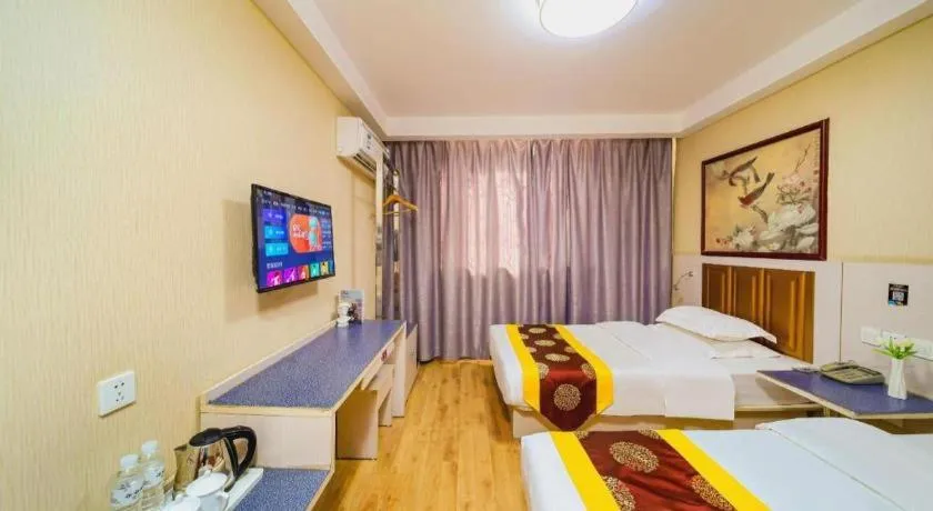 Bed in Kunlun Leju Business Hotel Kaifeng Gulou