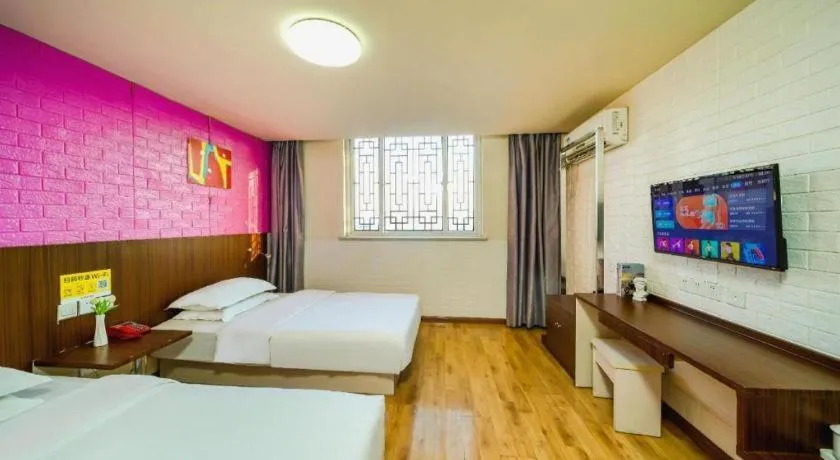 Bed in Kunlun Leju Business Hotel Kaifeng Gulou