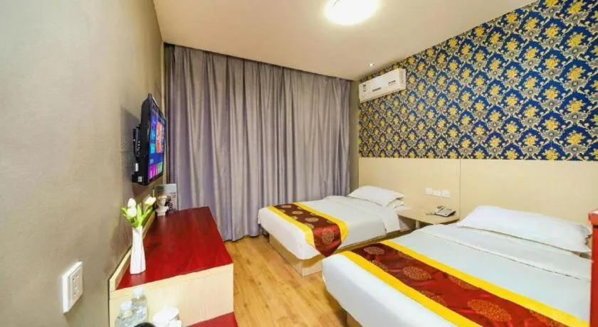 Bed in Kunlun Leju Business Hotel Kaifeng Gulou