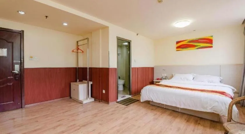 Bed in Kunlun Leju Business Hotel Kaifeng Gulou