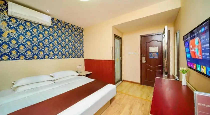 Bed in Kunlun Leju Business Hotel Kaifeng Gulou
