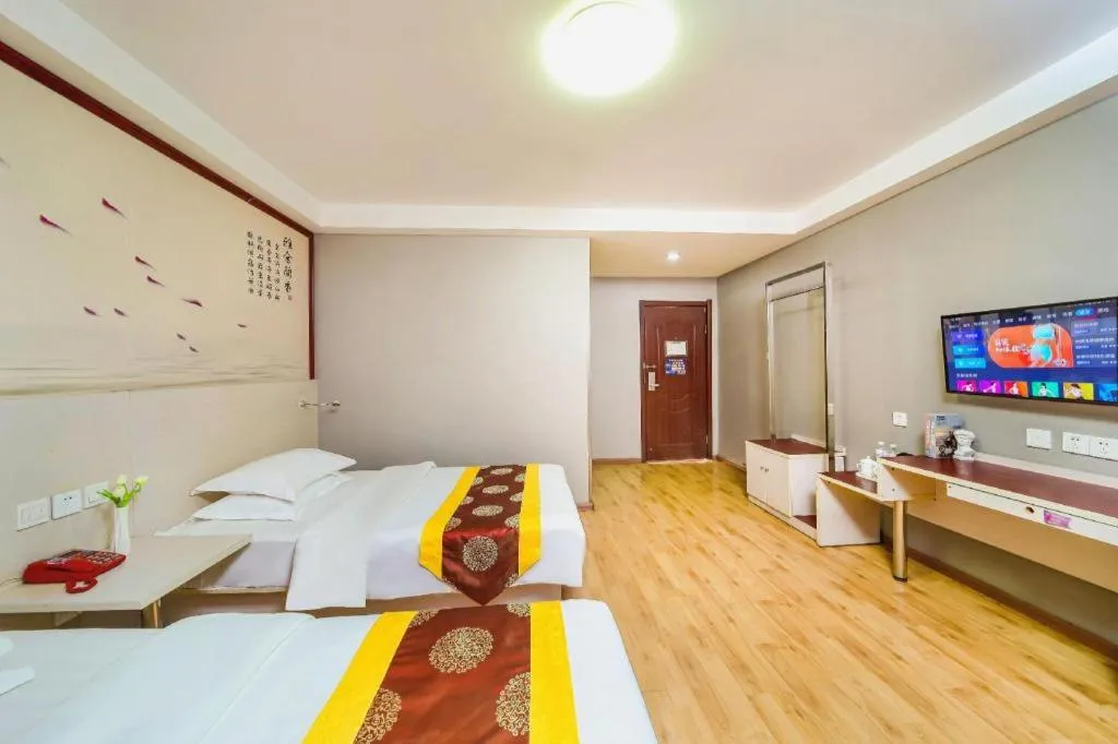 Bed in Kunlun Leju Business Hotel Kaifeng Gulou
