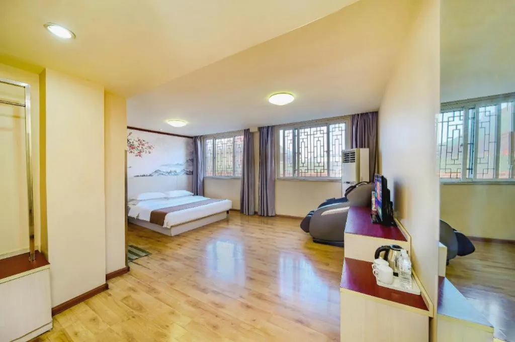 Bed in Kunlun Leju Business Hotel Kaifeng Gulou