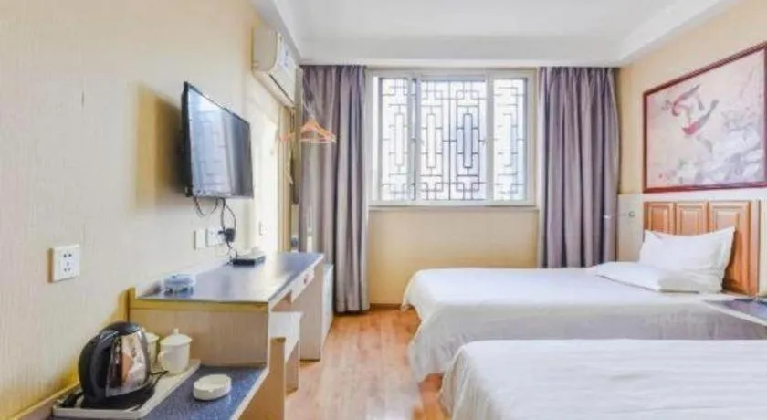 Bed in Kunlun Leju Business Hotel Kaifeng Gulou