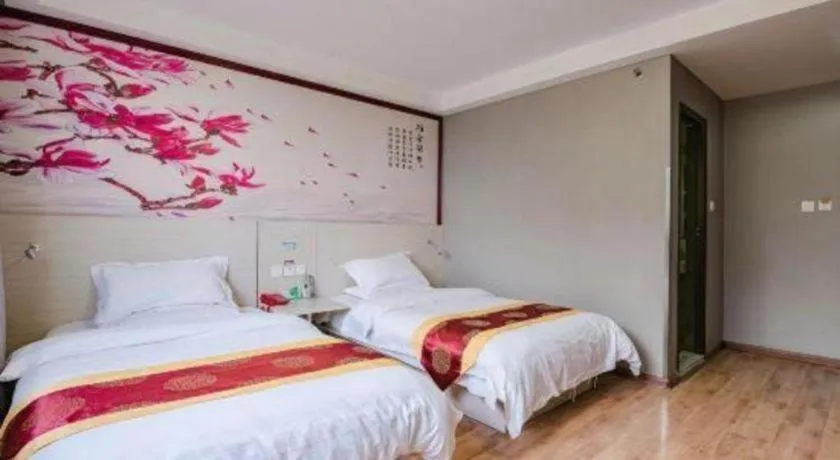 Bed in Kunlun Leju Business Hotel Kaifeng Gulou