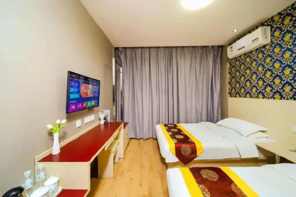 Bed in Kunlun Leju Business Hotel Kaifeng Gulou