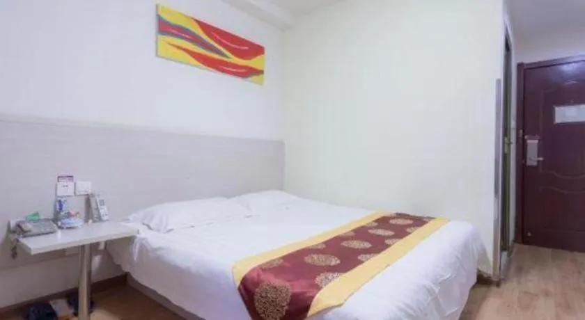 Bed in Kunlun Leju Business Hotel Kaifeng Gulou