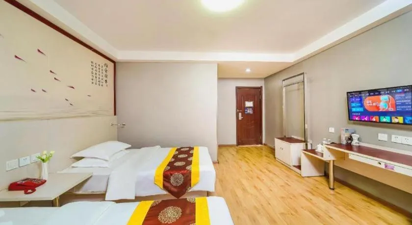 Bed in Kunlun Leju Business Hotel Kaifeng Gulou