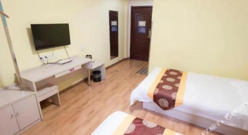 Bed in Kunlun Leju Business Hotel Kaifeng Gulou