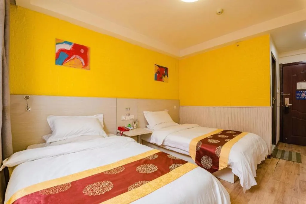 Bed in Kunlun Leju Business Hotel Kaifeng Gulou