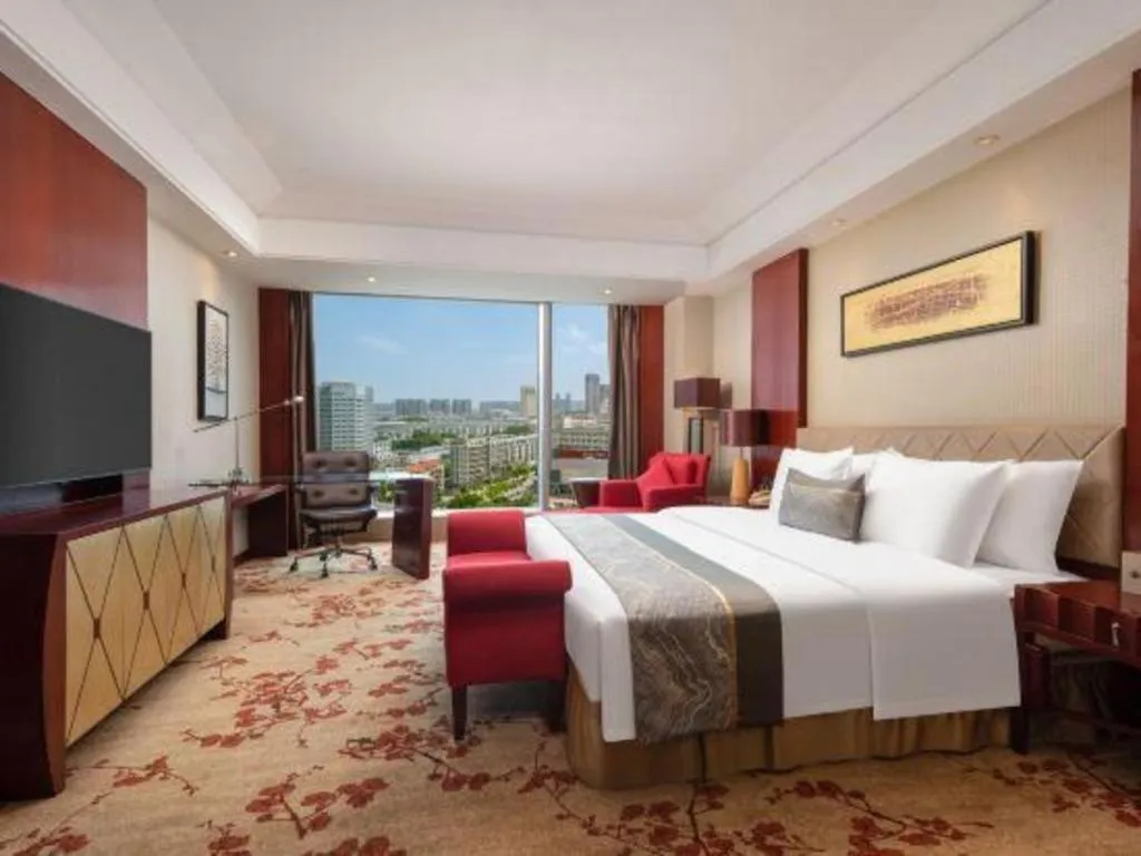 Bed in Wuhan Soluxe Hotel