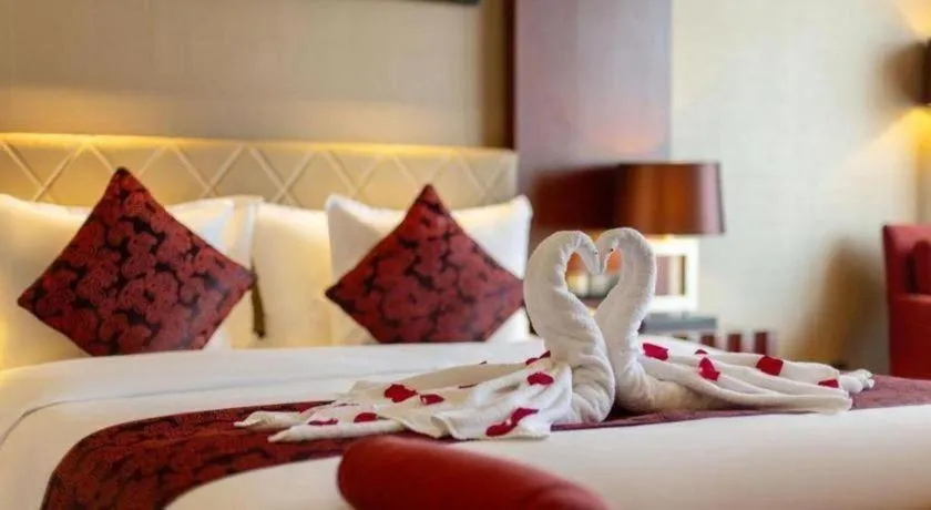 Bed in Wuhan Soluxe Hotel