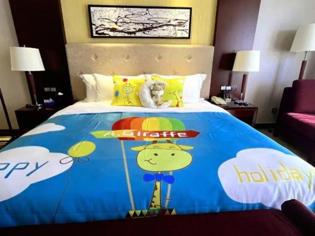 Bed in Wuhan Soluxe Hotel