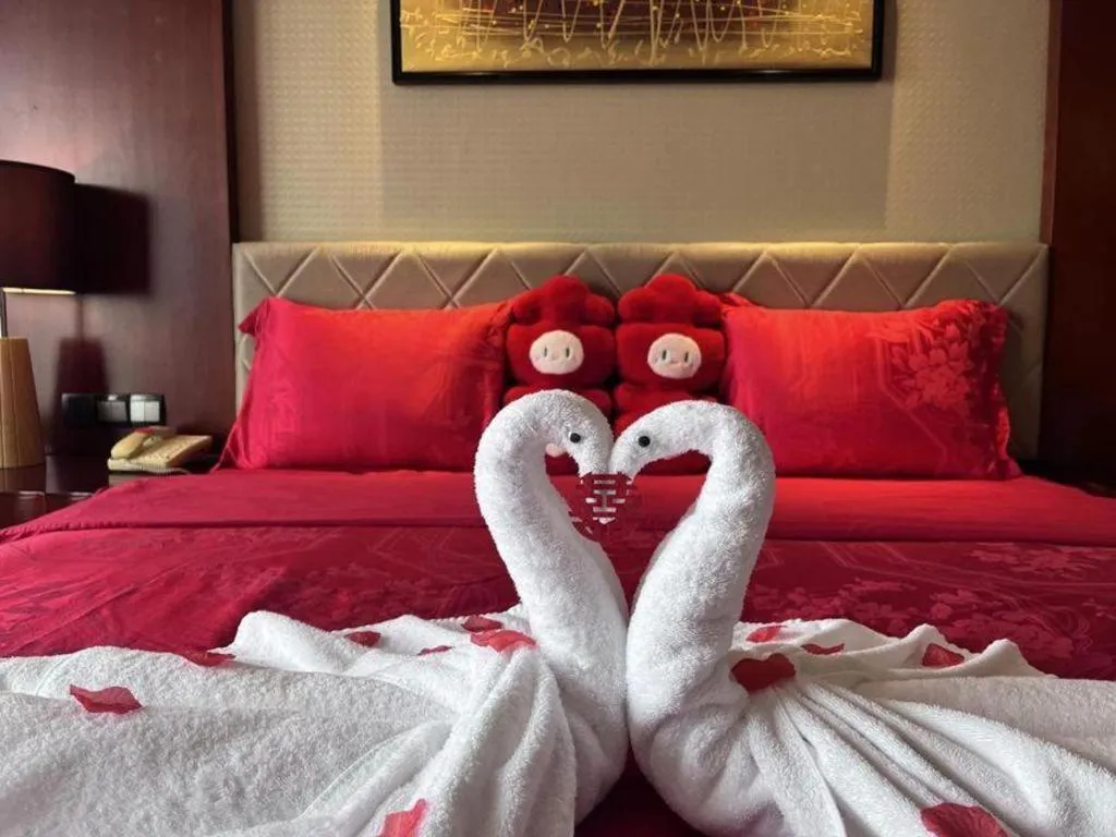 Bed in Wuhan Soluxe Hotel