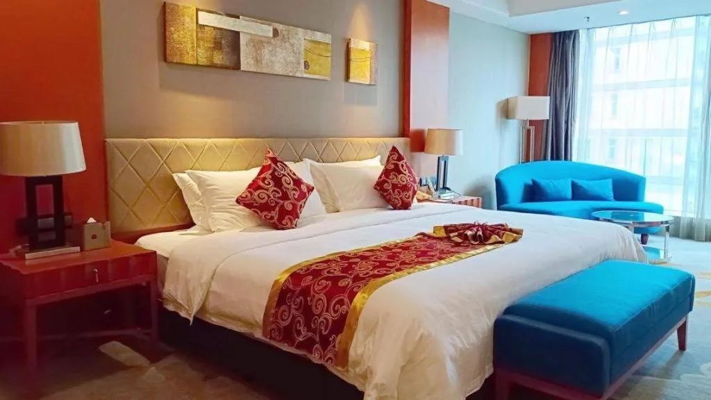 Bed in Wuhan Soluxe Hotel