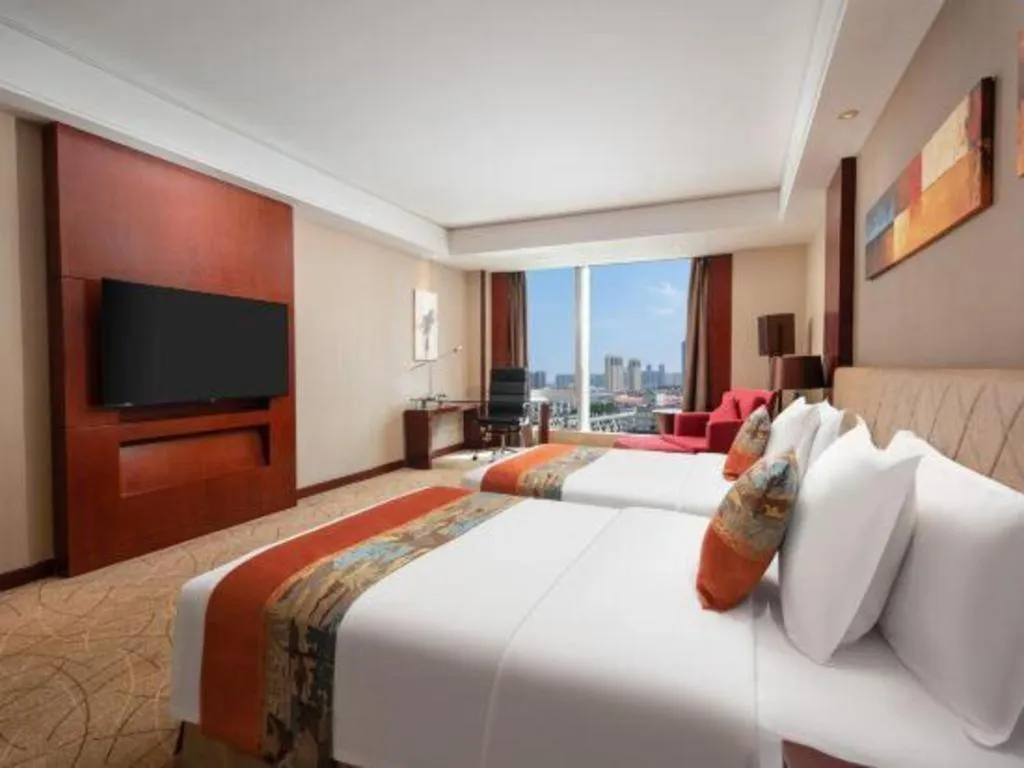 Bed in Wuhan Soluxe Hotel