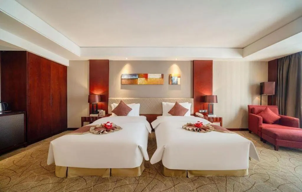 Bed in Wuhan Soluxe Hotel