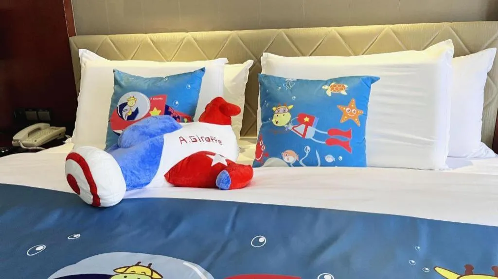 Bed in Wuhan Soluxe Hotel