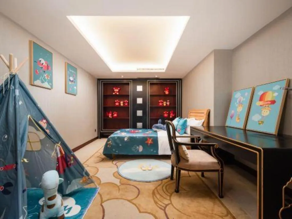 Bed in Wuhan Soluxe Hotel