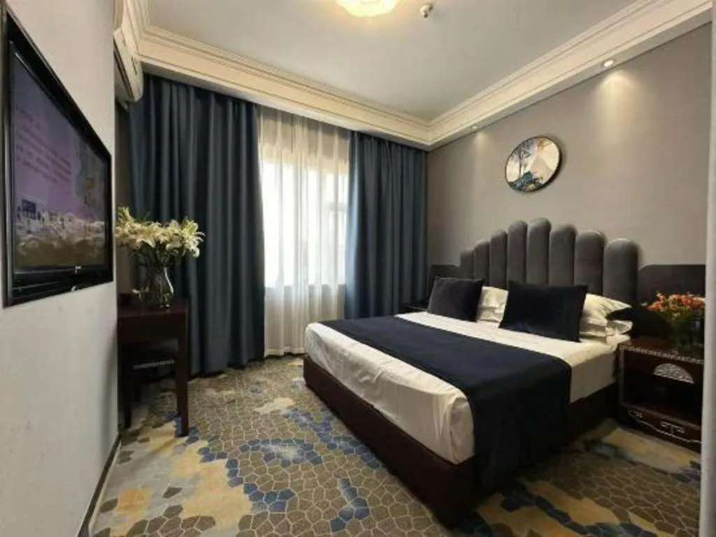 Bed in Dunhuang Dunhe Hotel