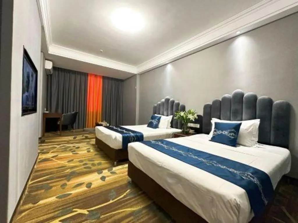 Bed in Dunhuang Dunhe Hotel