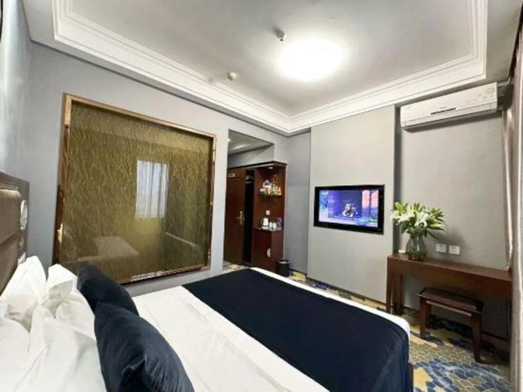 Bed in Dunhuang Dunhe Hotel