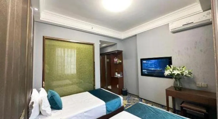 Bed in Dunhuang Dunhe Hotel