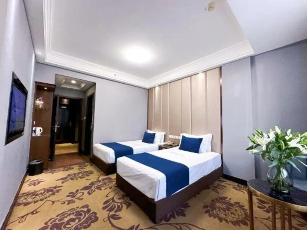 Bed in Dunhuang Dunhe Hotel