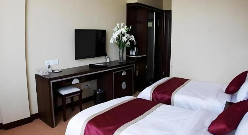 Bed in Dunhuang Dunhe Hotel