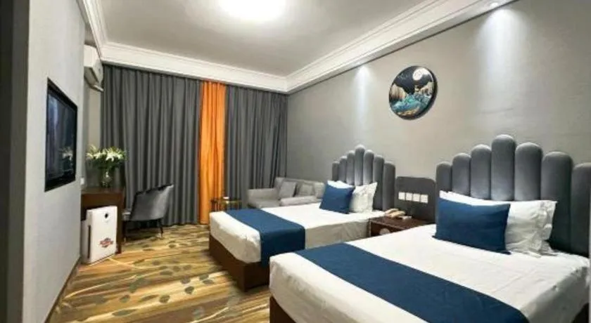 Bed in Dunhuang Dunhe Hotel