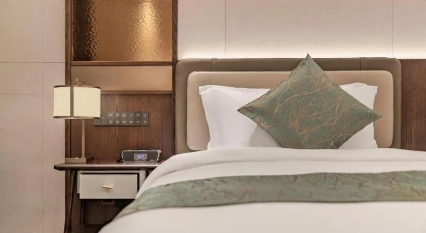 Bed in Dongguan Yingbin Hotel