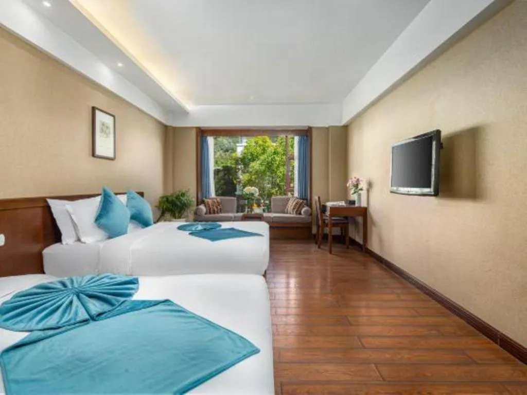 Bed in Lijiang Ziyue Hotel