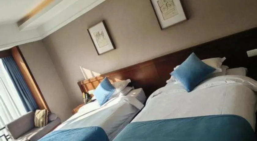 Bed in Lijiang Ziyue Hotel