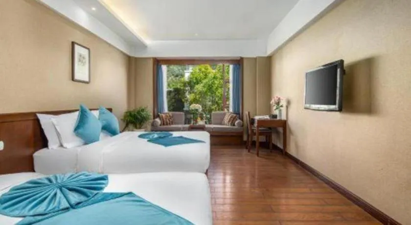 Bed in Lijiang Ziyue Hotel