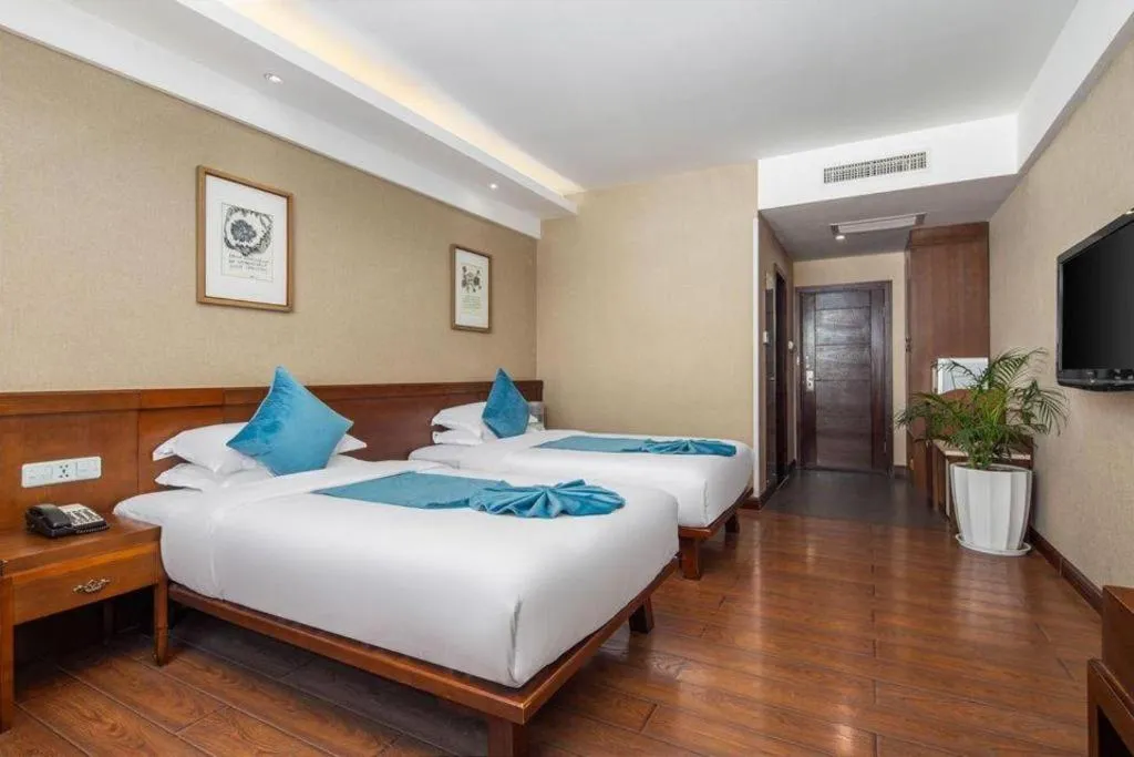 Bed in Lijiang Ziyue Hotel