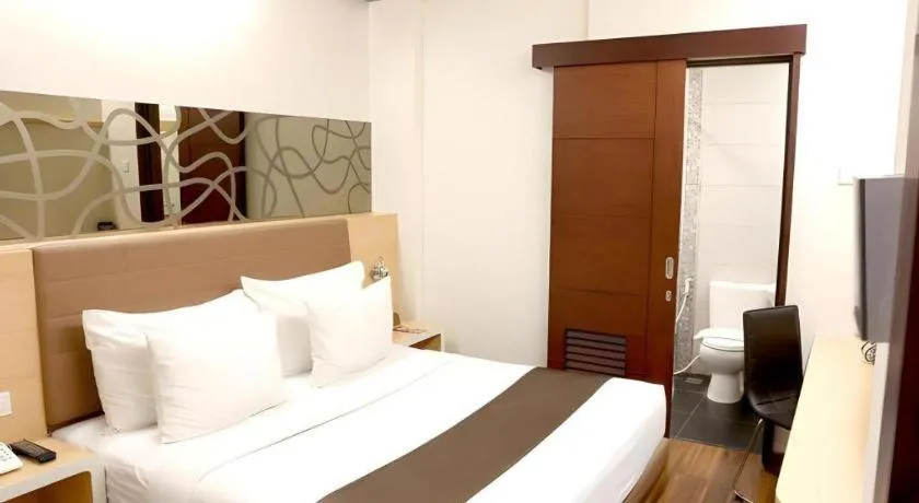 Bed in Sub City Hotel