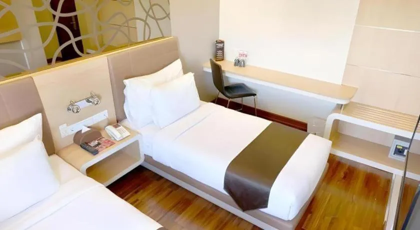 Bed in Sub City Hotel