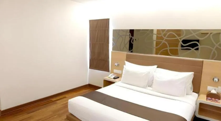 Bed in Sub City Hotel