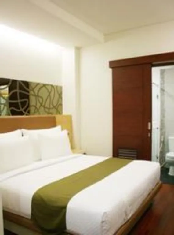 Bed in Sub City Hotel