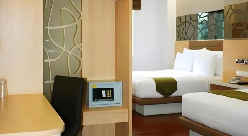 Bed in Sub City Hotel