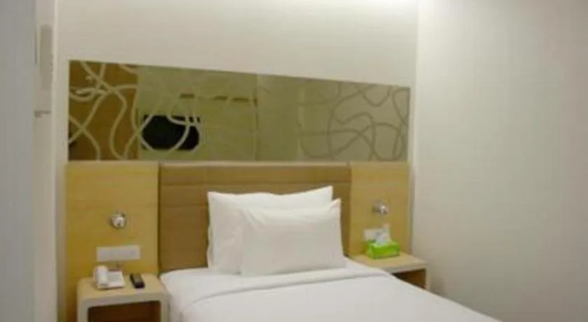 Bed in Sub City Hotel