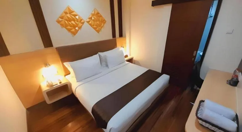 Bed in Sub City Hotel