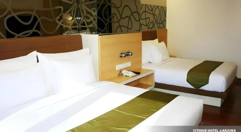 Bed in Sub City Hotel